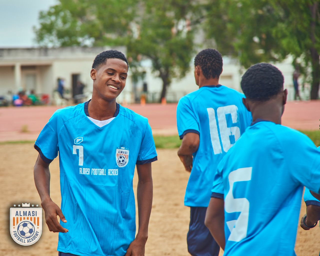 Almasi player in blue kit